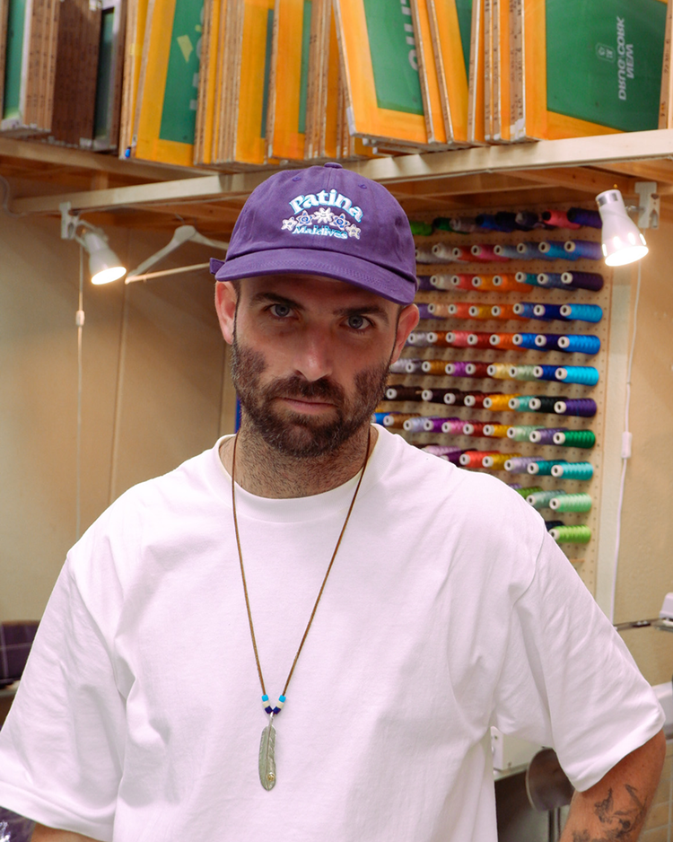 Sean Wotherspoon wearing purple hat