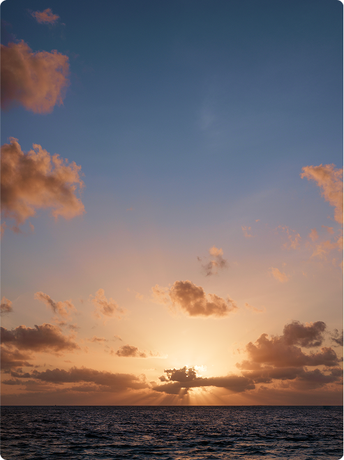 Ocean view with distant sunset