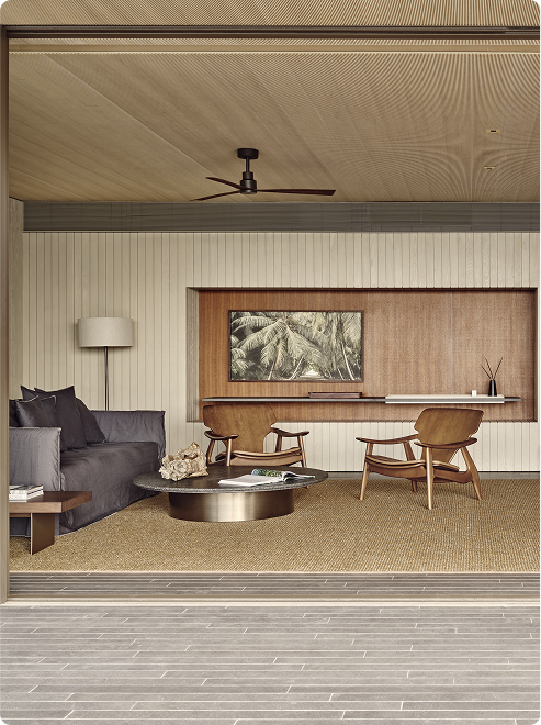 Minimalist lounge with neutral-toned furniture.