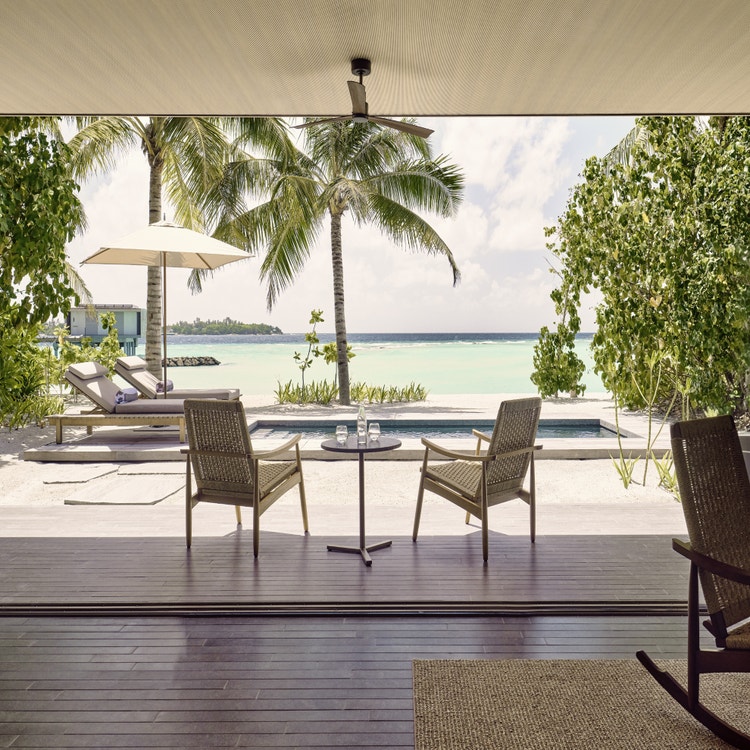 Ocean view from shaded patio seating.