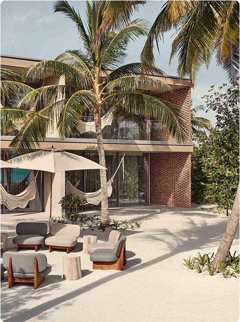Outdoor seating with hammocks and palms.