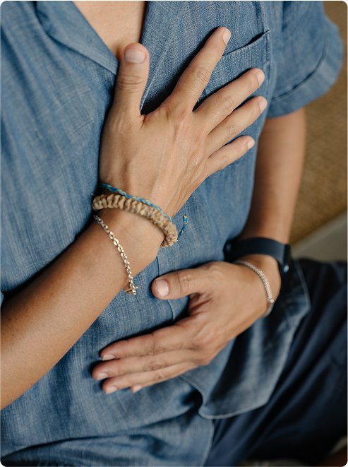 Hands placed for mindful breathing practice