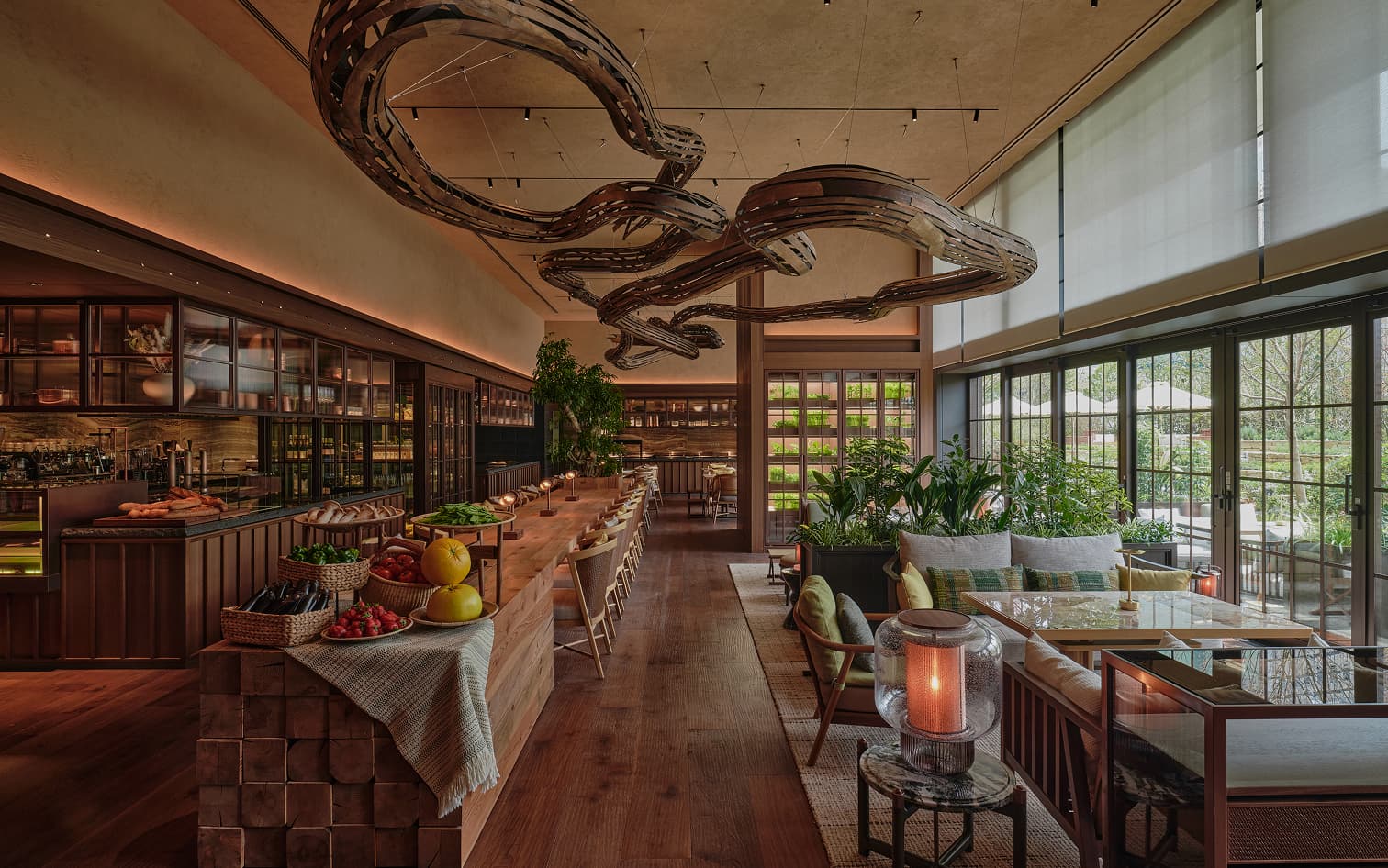 Sculptural ceiling above fresh produce table.