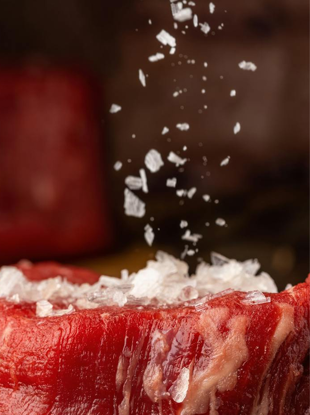 Raw steak prepared with falling crystals.