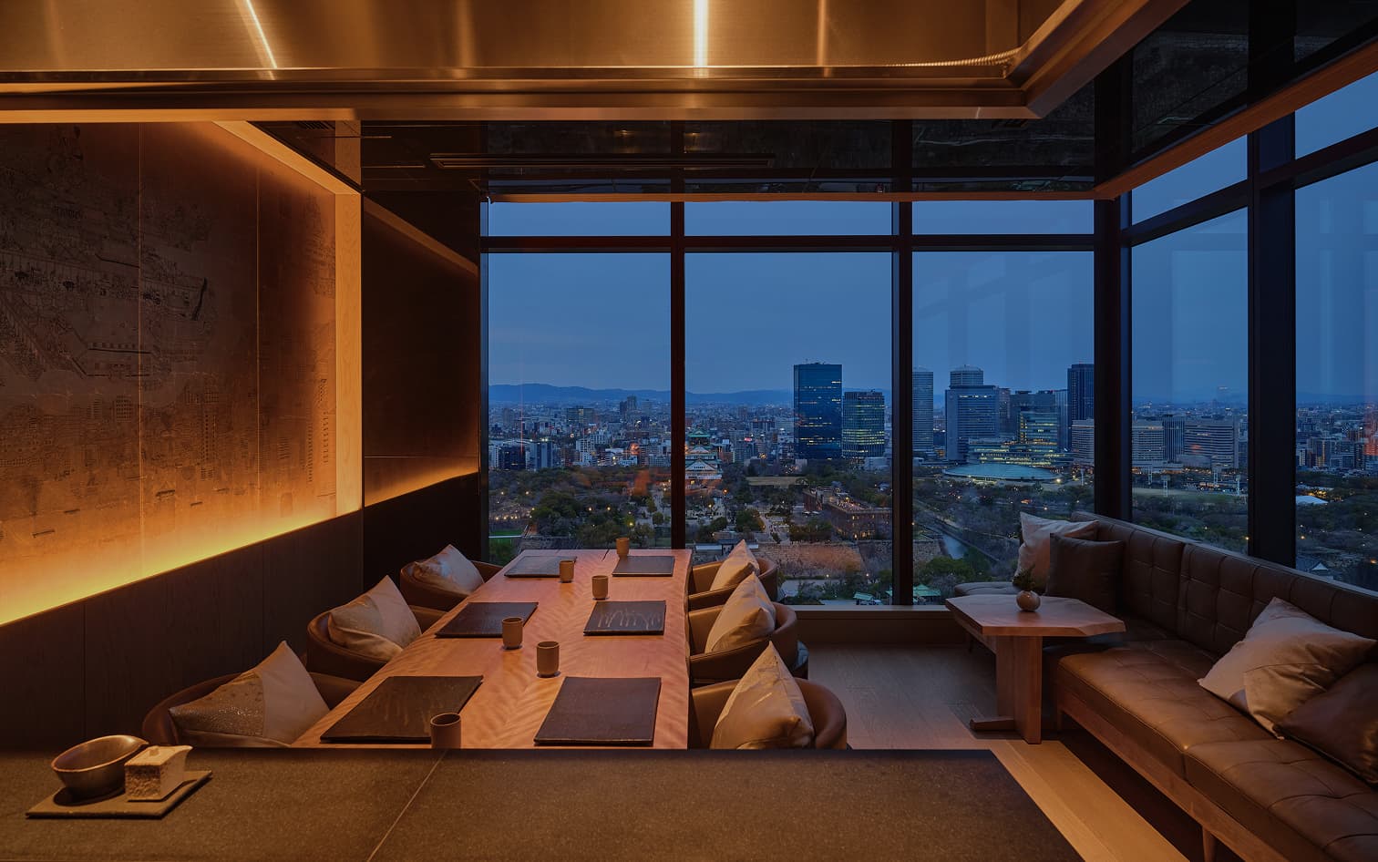 Panoramic city view from dining table at Barin.