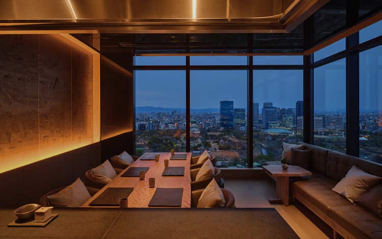 Panoramic city view from dining table at Barin.