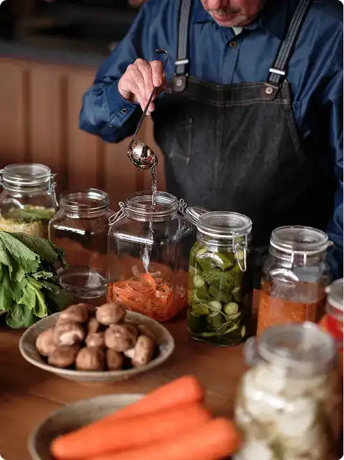 Kitchen counter with pickled vegetables.