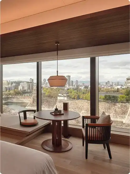 Elegant room with scenic Osaka backdrop.