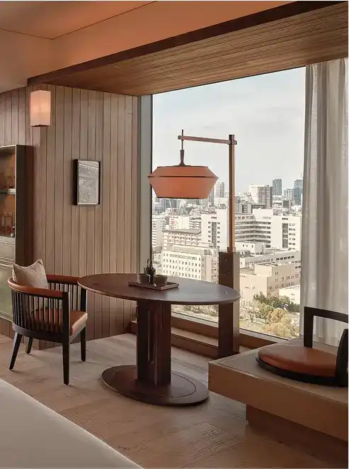 Wooden dining nook with skyline backdrop.