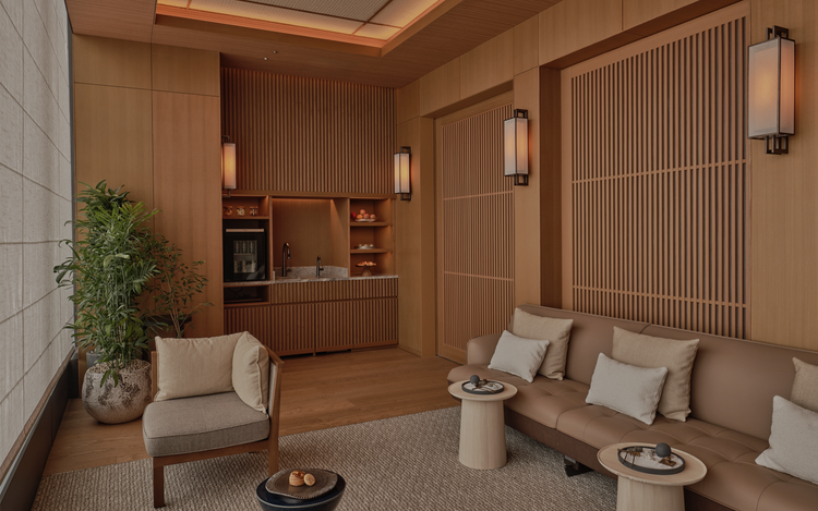 Cushioned seating beside decorative shelving.