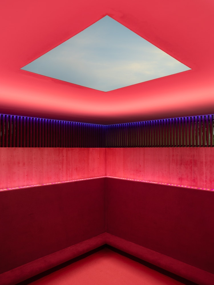 Red and purple lighting in modern interior.